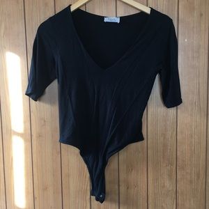 Black one-piece bodysuit
